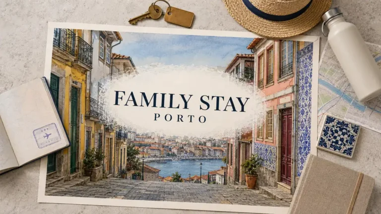 Porto street poster with colorful tiled facades overlooking the Douro, passport, room key, sunhat and water bottle.