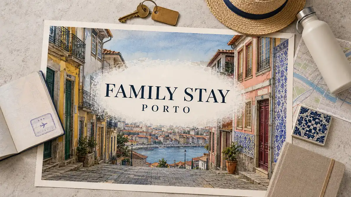 Where to Stay in Porto for Families 2 Porto street poster with colorful tiled facades overlooking the Douro, passport, room key, sunhat and water bottle.