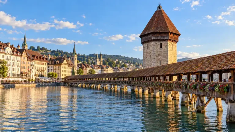 Lucerne’s covered Chapel Bridge and octagonal Water Tower over the Reuss River
